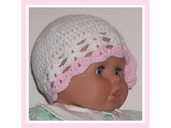 White Baby Hat With Pink Trim And Flower