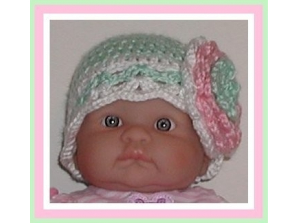 Mint green hat for baby girls with pink and white flower