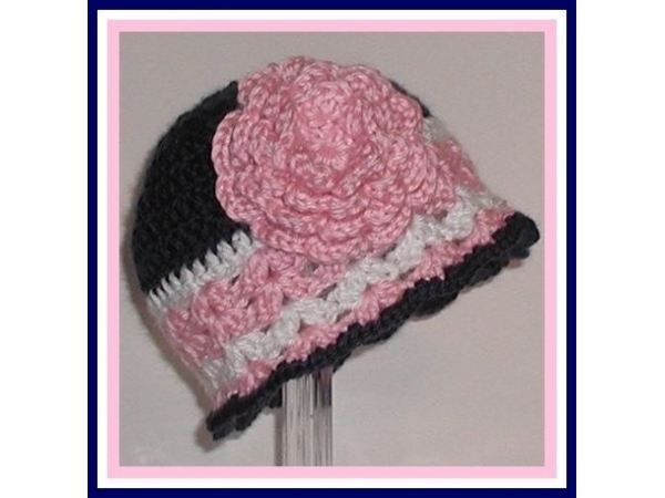 Navy blue and white stripes baby girls hat with a pink flower