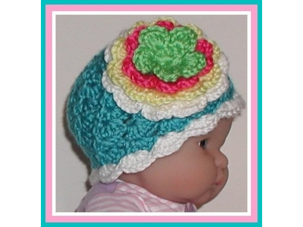 Turquoise and white baby girls hat