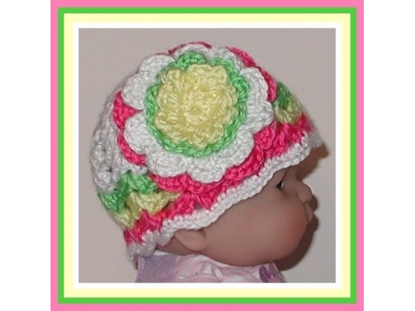 White and green baby girls hat