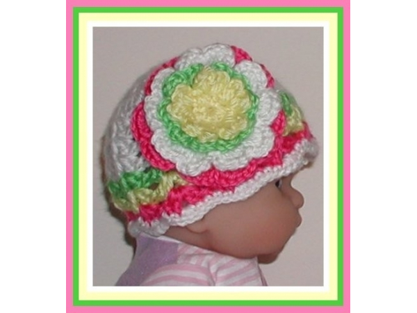 White newborn girls hat with hot pink and lime green