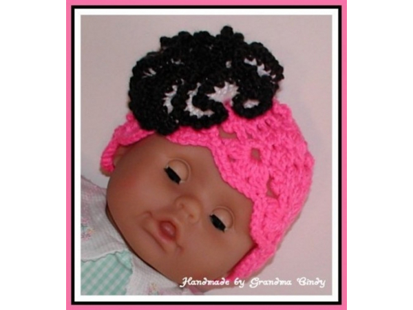 Neon pink and black hat for babies
