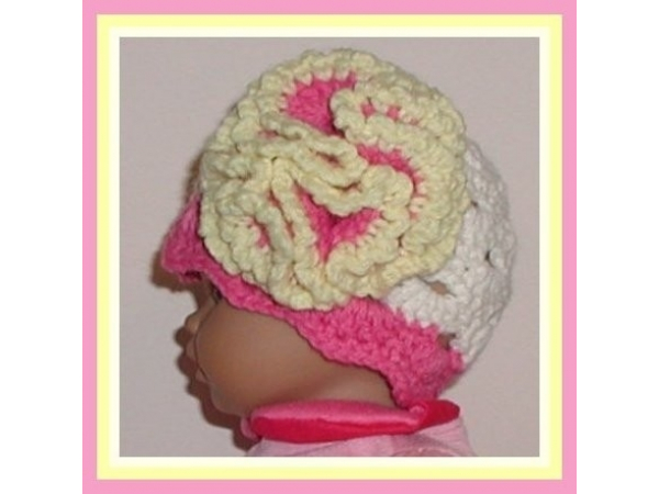 Cream preemie girls hat with pink