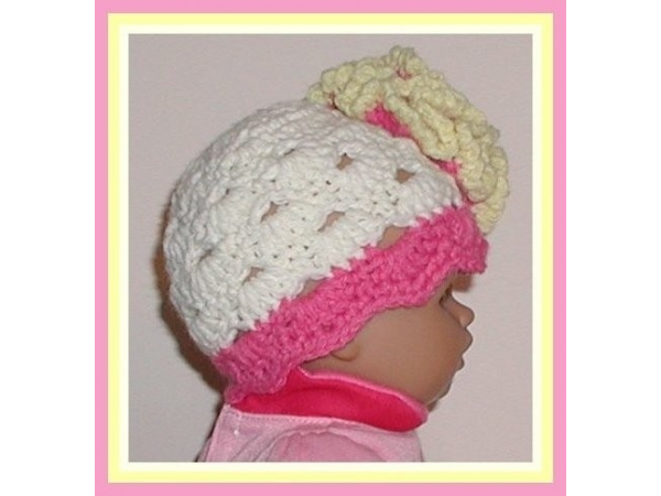 Cream and yellow baby girls hat pink flower