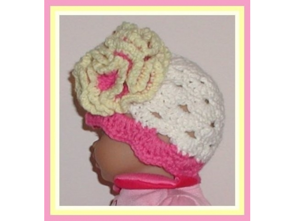 Cream preemie girl hat with pink and yellow flower