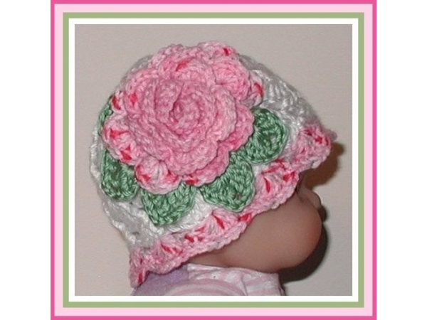 White baby girls hat with pink rose