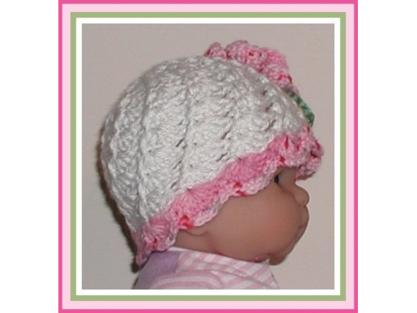 White baby girls hat with pink rose and sage leaves