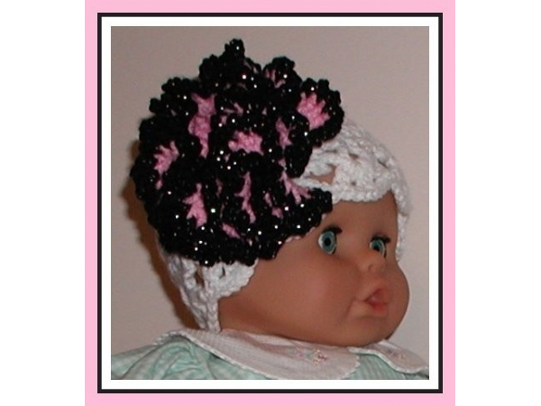 White lace baby girl hat with big pink flower