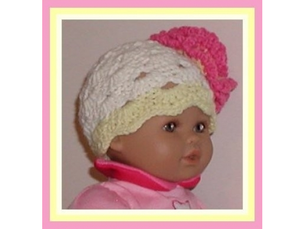 Cream preemie girls hat with a flower