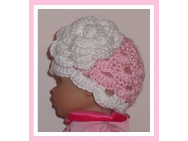 Pink preemie hat with large white flower