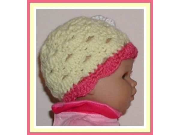 Yellow and pink hat for preemie girls with white flower