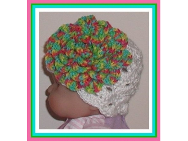 White newborn girls hat with extra large flower