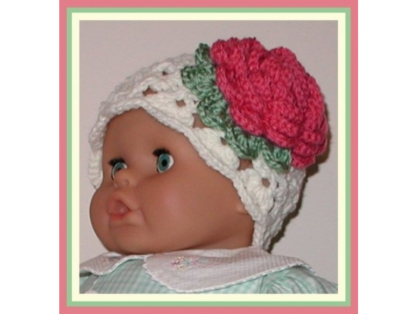 Coral rose pink flower on cream baby hat for girls