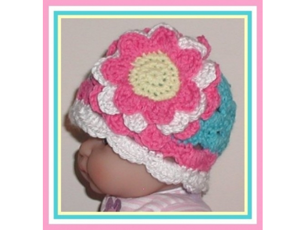 turquoise hat for baby girls with big pink and yellow flower