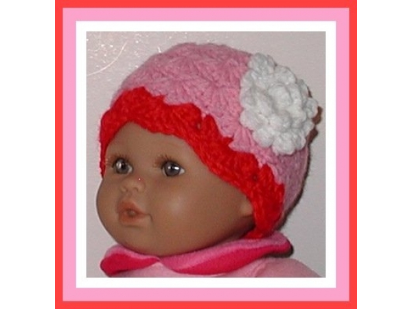 pink and red hat for preemie girl has a white flower