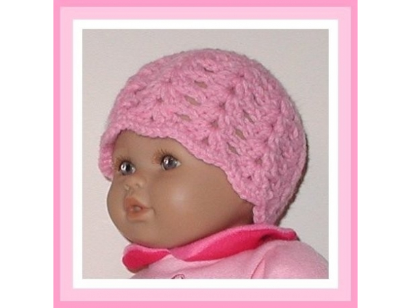pink preemie hat with a white flower
