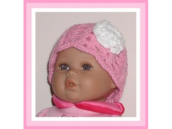 preemie hat for girls in pink with a white flower