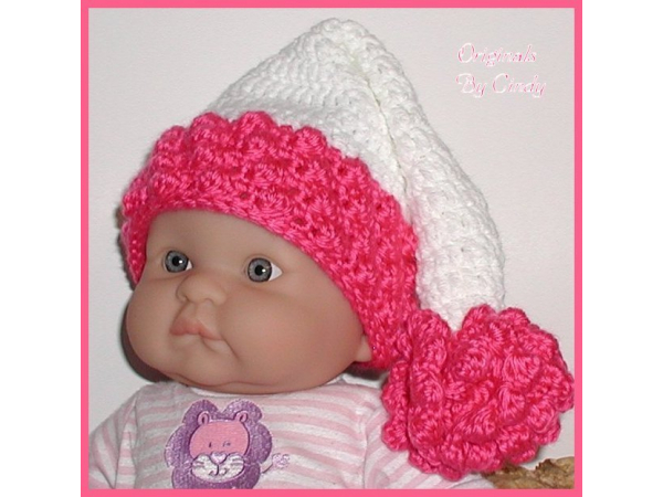white elf hat for newborn girls with dark hot pink flower