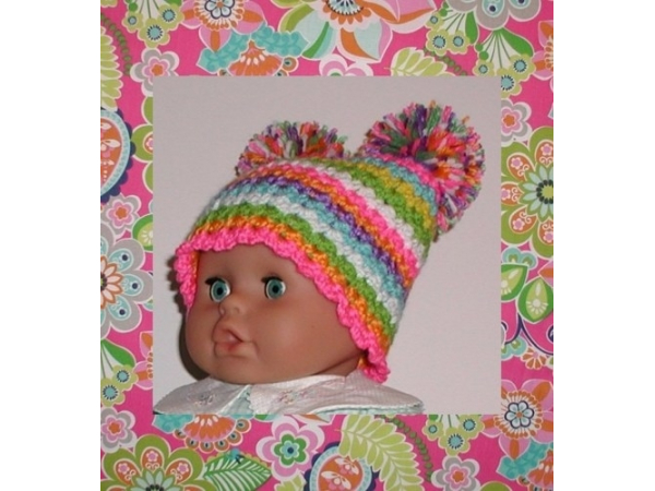 bright multi colored toddler girls pom pom hat