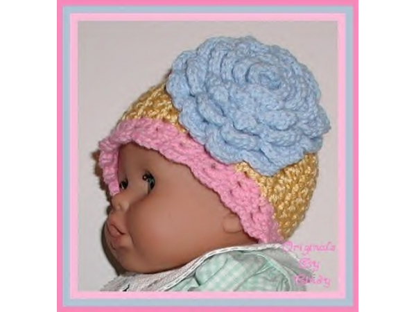 yellow and pink hat for baby girls with extra large blue flower