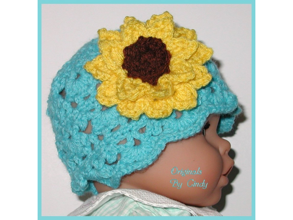 turquoise baby girl hat with big yellow sunflower