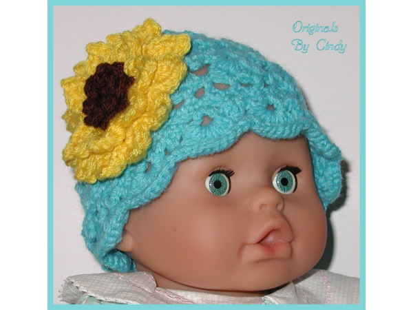 turquoise baby girl hat with big yellow sunflower