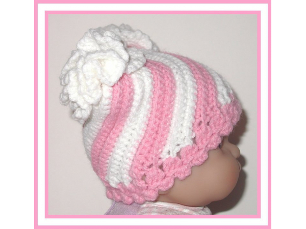 pink and white swirly baby girl hat