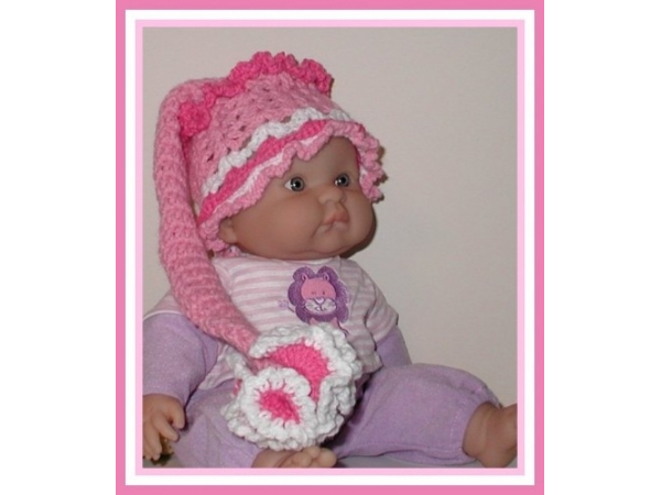 newborn hat with long tail and ruffle flower
