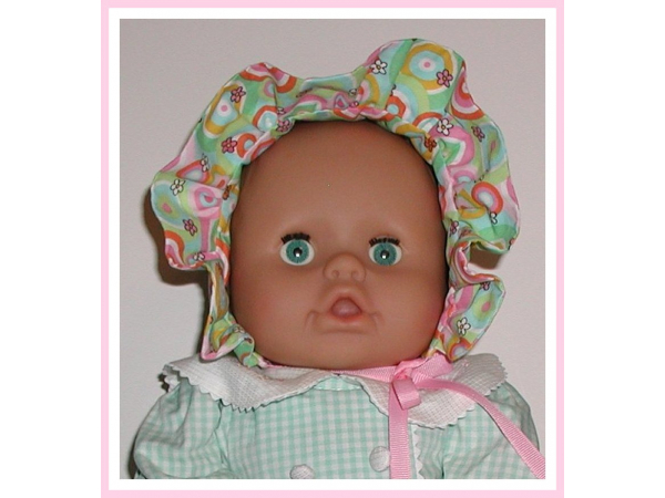 Pink white green baby bonnet