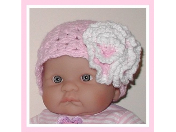 pink and white newborn girl hat with flower
