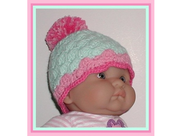 mint green and hot pink baby girls hat