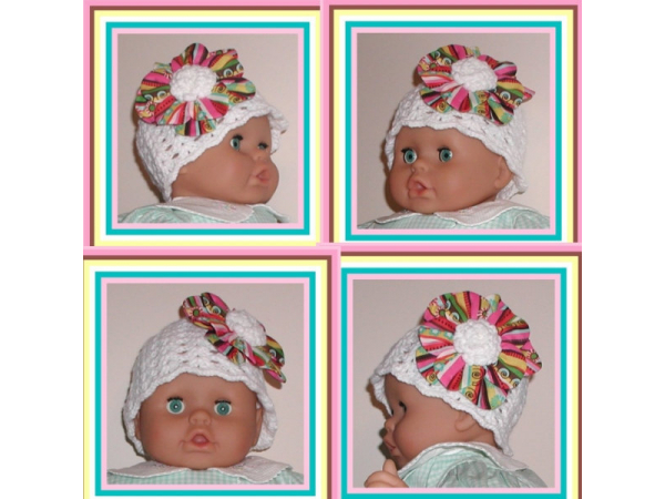 white baby girl hat with a big flower