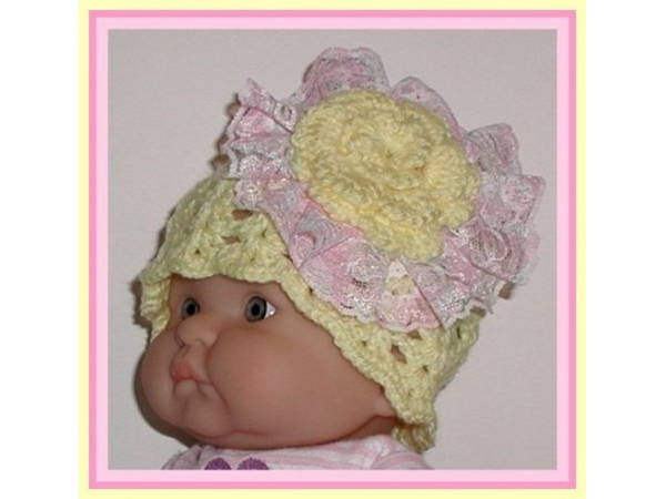yellow newborn girl hat with pink lace