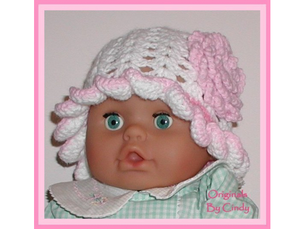 white baby girl hat with pink flower
