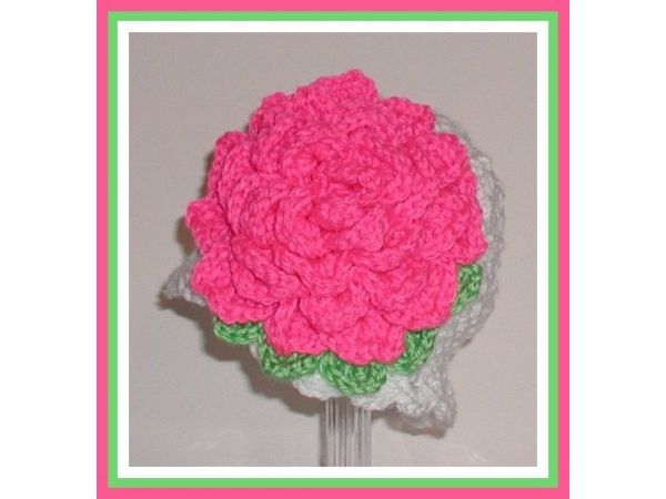 white baby hat photo prop with oversized neon pink flower