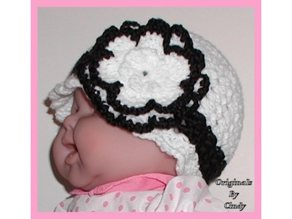 black and white baby girls hat with a big flower