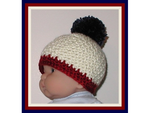 cream and navy blue baby boys hat
