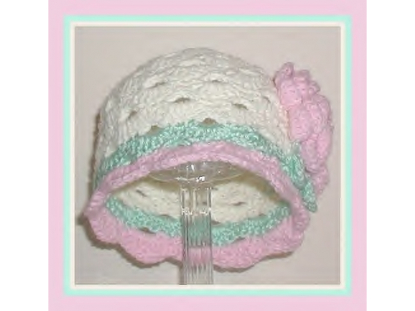 Cream and pink baby hat