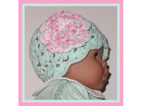 mint green lace hat for baby girl with large pink flower