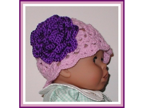 Lavender baby girls hat with a white flower
