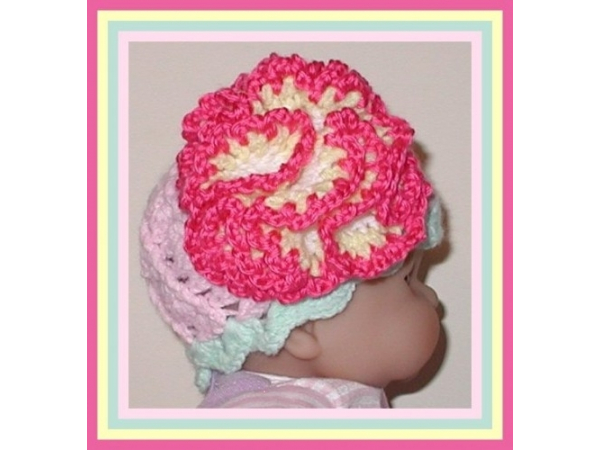 Newborn hat with pink and yellow flower