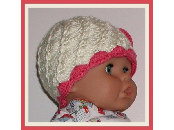 coral and cream baby girls hat