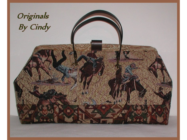 western tapestry carpet bag with bull riders