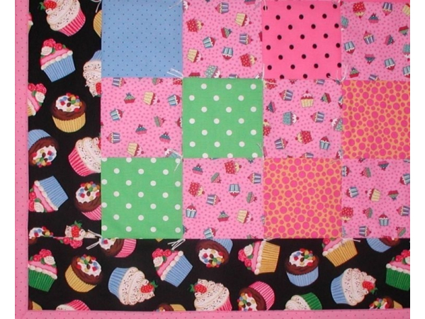 Quilt for baby girls with cupcakes