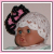White lace baby girl hat with extra large hot pink and black fascinator flower