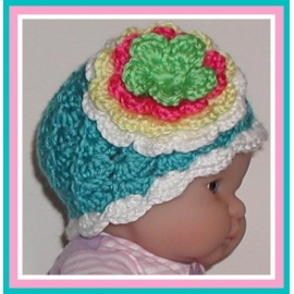 Turquoise and white baby girls hat