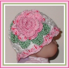 White baby girls hat with pink rose