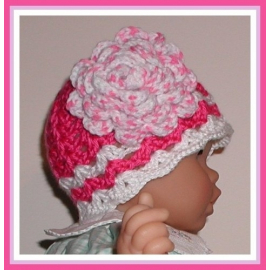 shocking pink hat for baby girls with a large flower