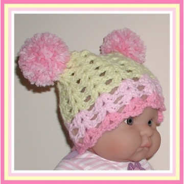 Yellow And Pink Baby Hat With Pompoms